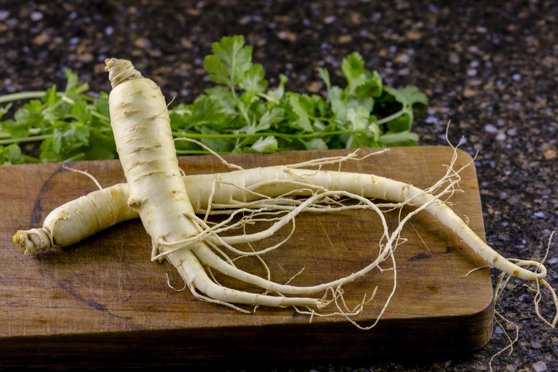 North American Ginseng root on chopping board