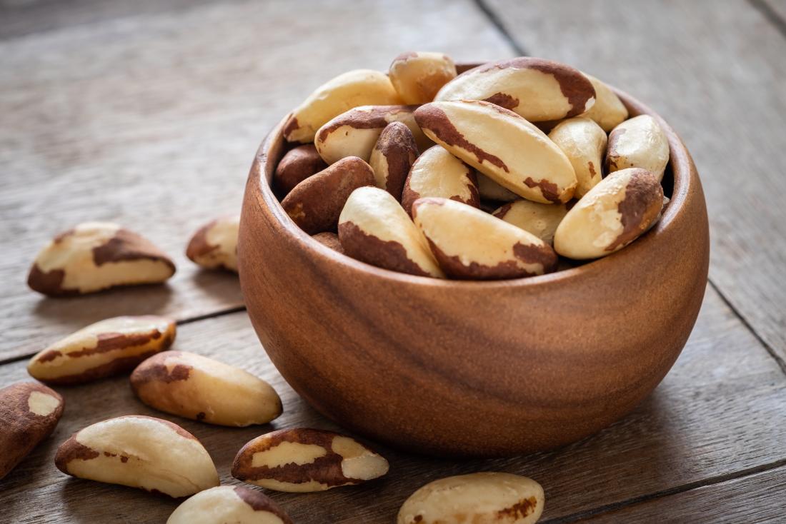 Brazil nuts as food for hair growth in bowl