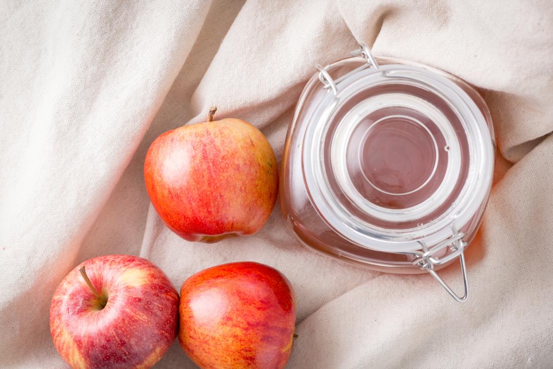 Apple cider vinegar in jar for treating gout.