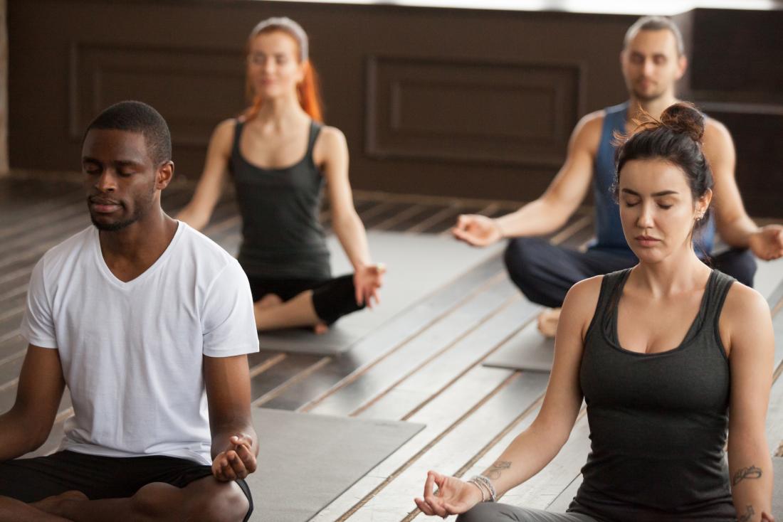 group of people meditating