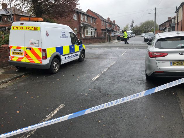 A police cordon in place at Walker Avenue in Bolton where a 15-year-old boy was stabbed several