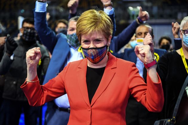 Scotland's First Minister and leader of the Scottish National Party (SNP), Nicola Sturgeon reacts after...
