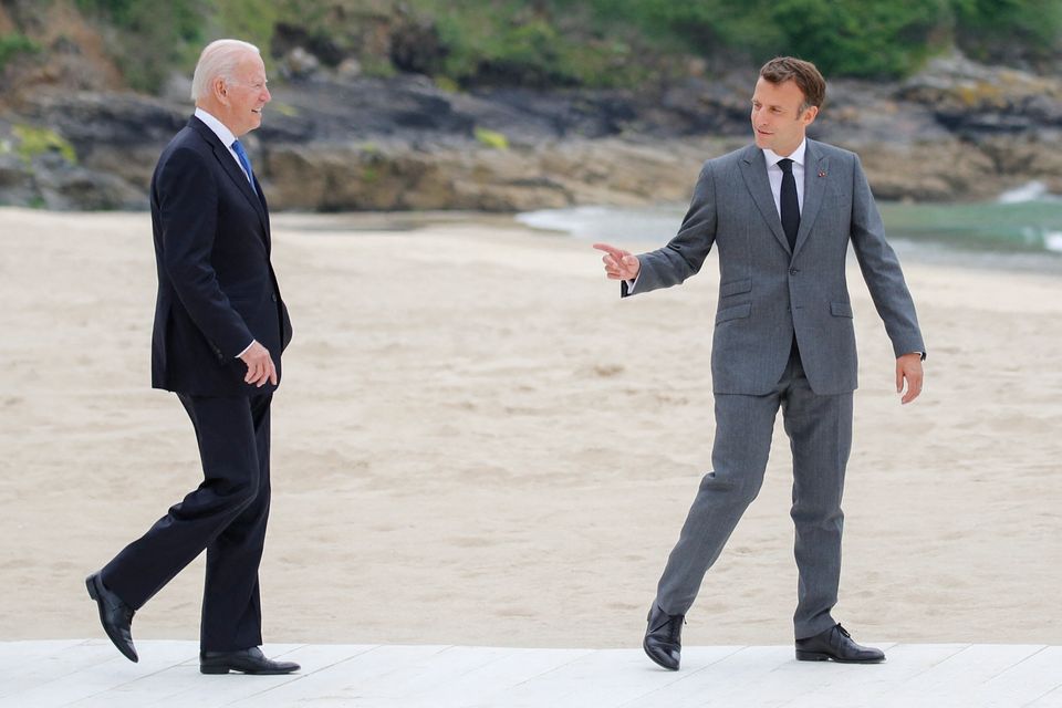 French president Emmanuel Macron (right) greets US president Joe Biden at the G7