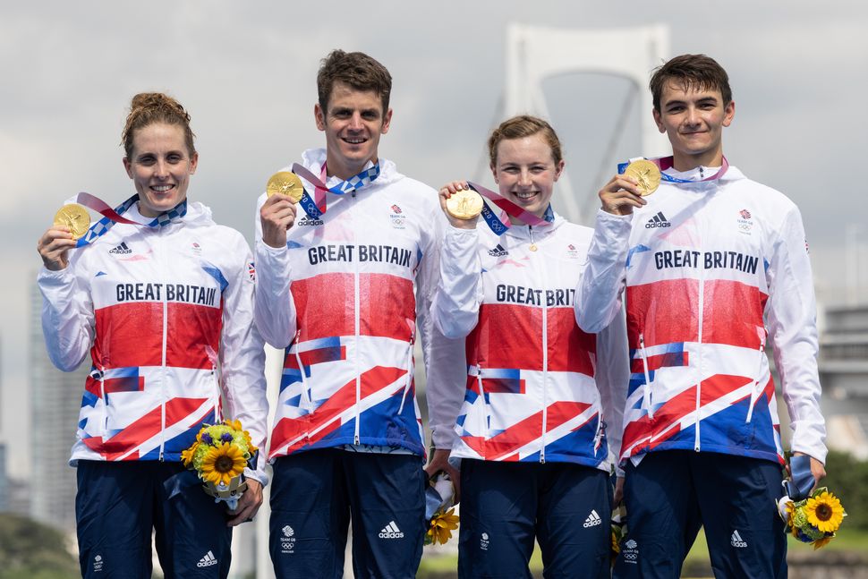 Team GB's Mixed Relay Triathlon team show off their gold medals