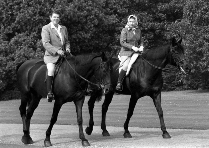 US President Ronald Reagan goes riding in Windsor Home Park with the Queen