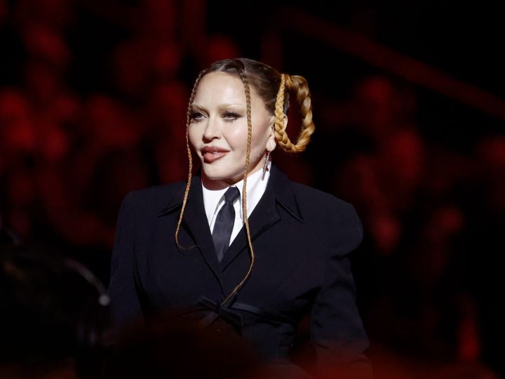 Madonna speaks onstage during the Grammys