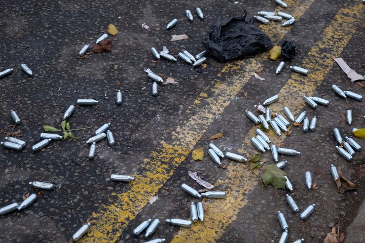 Empty cannisters of laughing gas lying on the street in Birmingham.