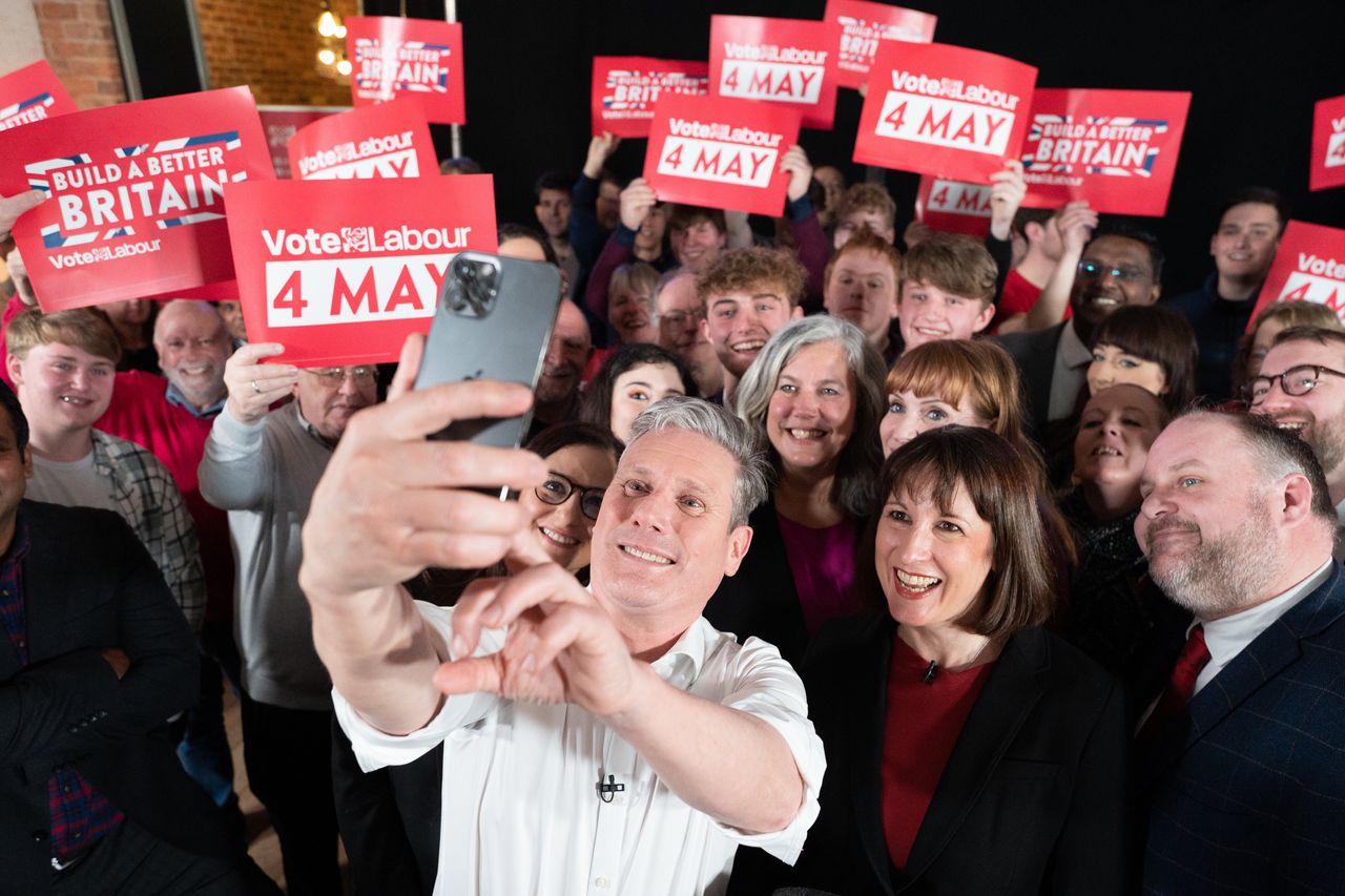 Keir Starmer takes a selfie with shadow cabinet members and Labour members at the party's local election launch in Swindon.