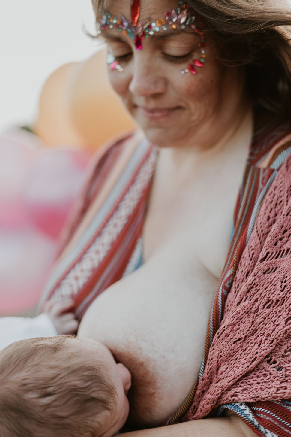 Helen breastfeeding her child.