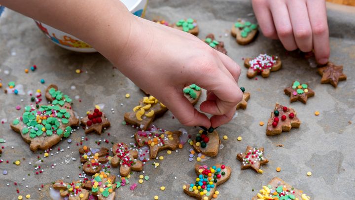 Wax paper is a good idea if you're decorating already-baked cookies, but you should never bake cookies on it.