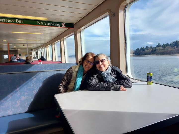 "This is me (right) on the ferry to Bainbridge with my writer pal, Jen," the author writes.