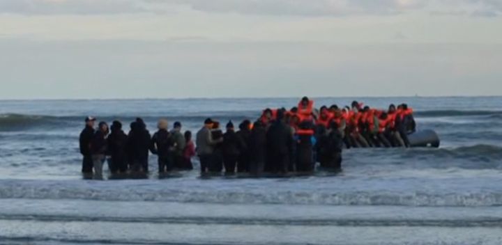 Asylum seekers preparing to cross the Channel this morning.