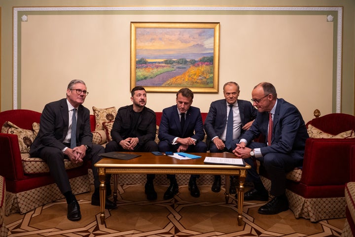 From left, British Prime Minister Keir Starmer, President Volodymyr Zelenskyy, French President Emmanuel Macron, Polish Prime Minister Donald Tusk and German Chancellor Friedrich Merz make a call to U.S. President Donald Trump from Kyiv, Ukraine, on Saturday, May 10, 2025. 