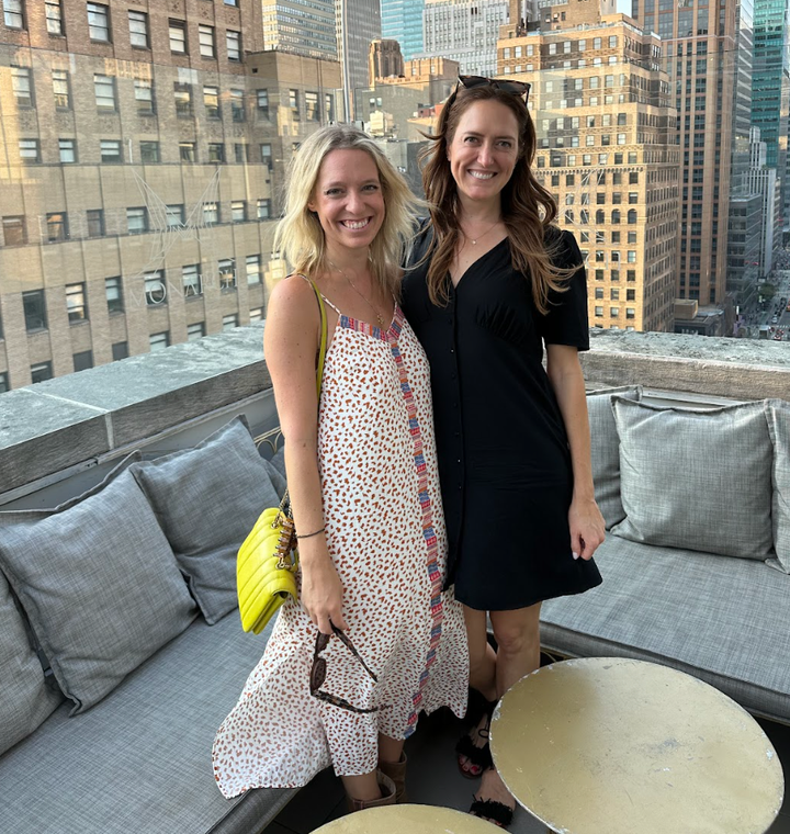 The author (left) celebrating the single freelance life in New York City with her best friend at the end of 2024.