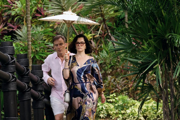 Jason Isaacs and Parker Posey on the set of The White Lotus season three