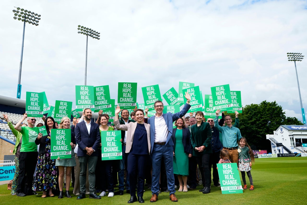 Green Party co-leaders Adrian Ramsay and Carla Denyer pose with supporters at their General Election Manifesto launch - Real Hope, Real Change, at Sussex County Cricket Ground in Hove, June 12, 2024.