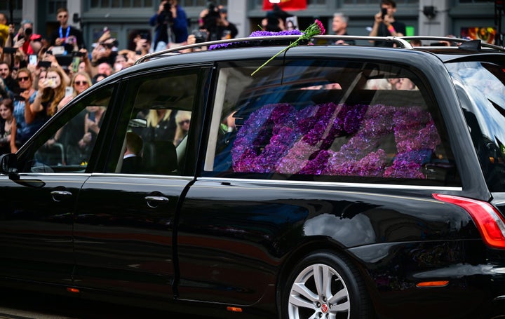 Ozzy Osbourne's hearse was adorned with purple floral arrangements