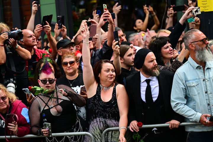 Fans chanted "Ozzy, Ozzy, Ozzy, oi, oi, oi!" as the Black Sabbath's hearse passed by