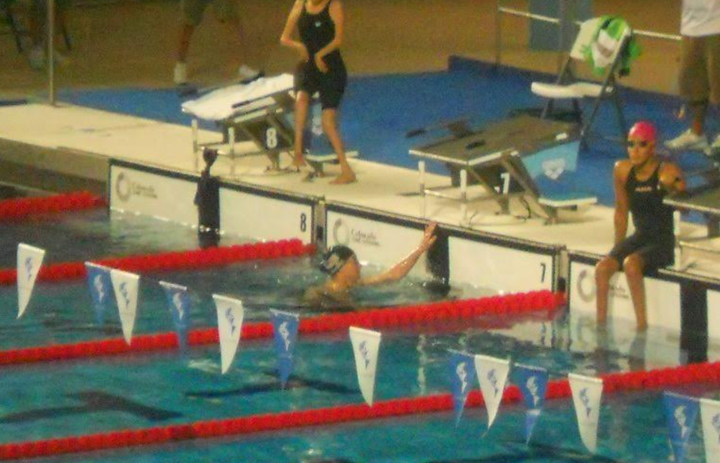 The author (in the water) at the Parapan American Games in Guadalajara, Mexico, in 2011. "I was one of the only athletes in my classification who had to start in the water," she writes.
