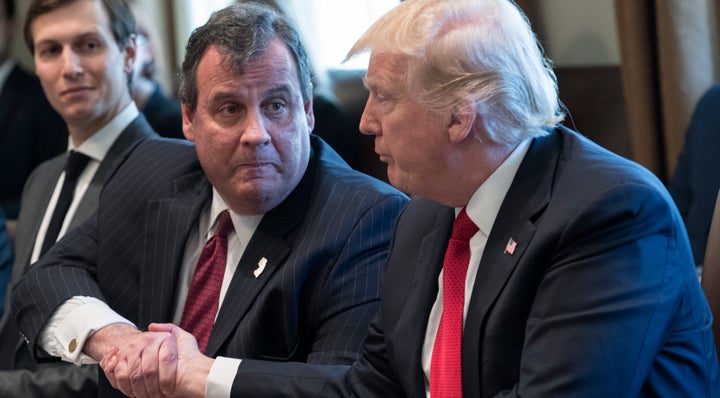 WASHINGTON, DC - MARCH 29: U.S. President Donald Trump (L) shakes hands with New Jersey Gov. Chris Christie at a panel discussion on an opioid and drug abuse in the Roosevelt Room of the White House March 29, 2017 in Washington, DC. (Photo by Shawn Thew-Pool/Getty Images)