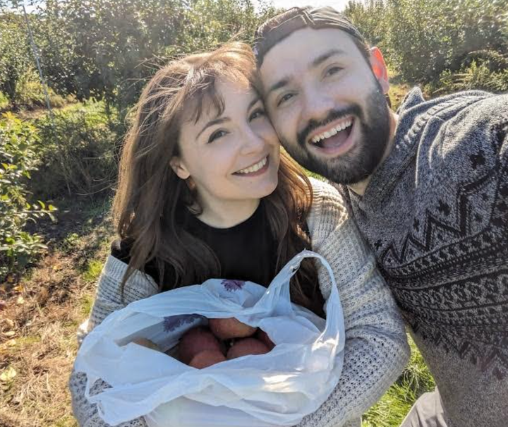 The author and her boyfriend Seb picking apples on a gorgeous fall day.