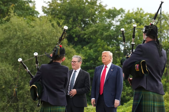 Bagpipers play as President Donald Trump and Britain's Prime Minister Keir Starmer arrive at Trump International Golf Links, near Aberdeen, Scotland, Monday, July 28, 2025. 