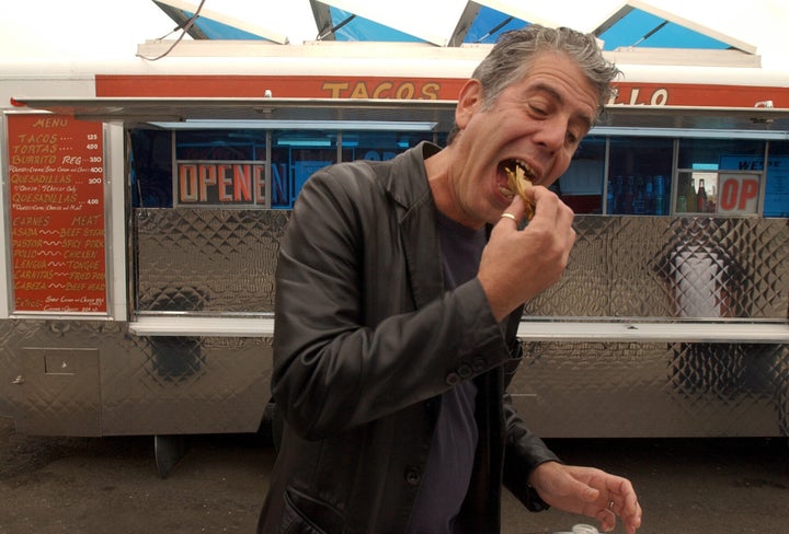 Anthony Bourdain eats a carne asada taco from a food truck in Oakland, California, during an episode of No Reservations in 2007.