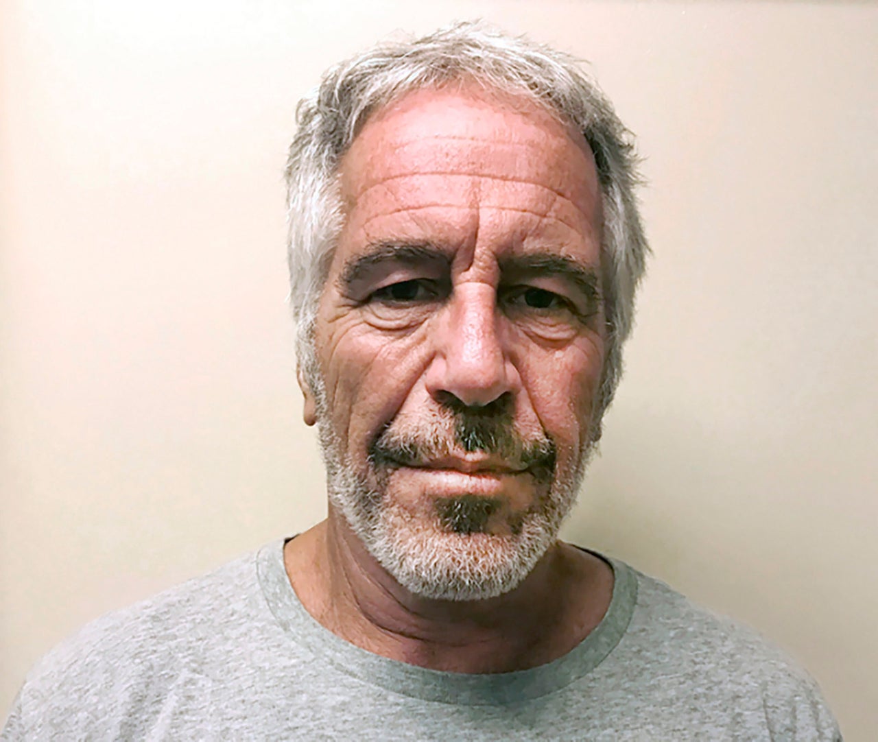 In this image provided by the New York State Sex Offender Registry, Jeffrey Epstein has his photo taken March 28, 2017. 