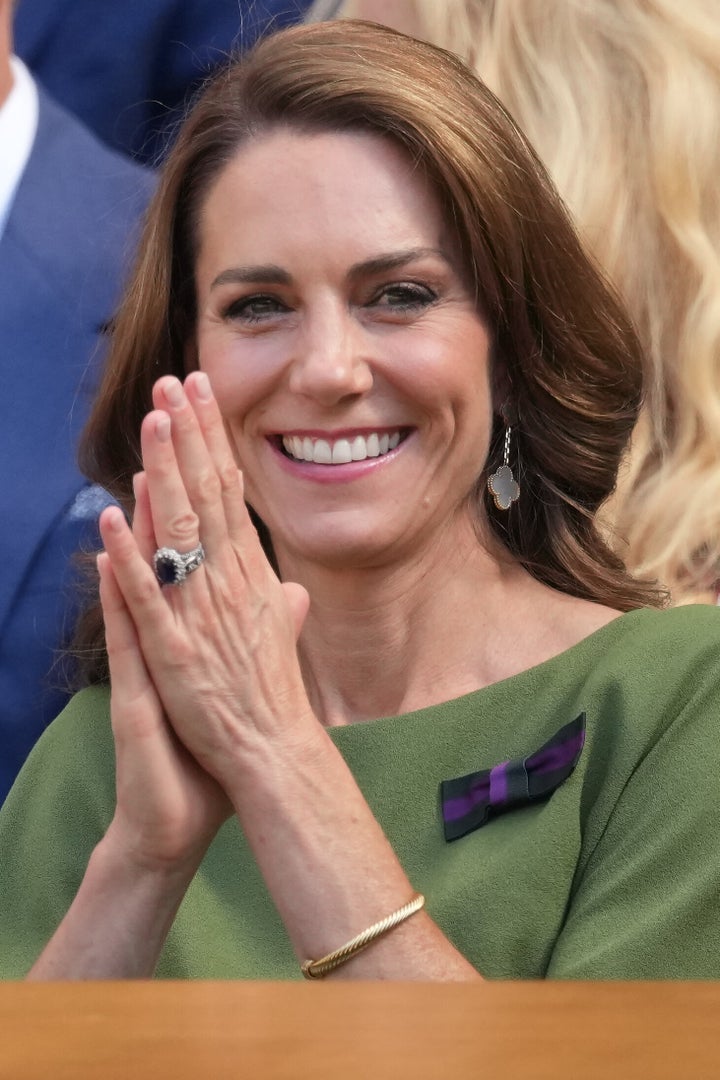 Britain's Kate, Princess of Wales, waves from the Royal Box, during the men's singles on day 14 of the Wimbledon Tennis Championships in London, Sunday, July 12, 2026. (Photo by Dave Shopland/Invision/AP)