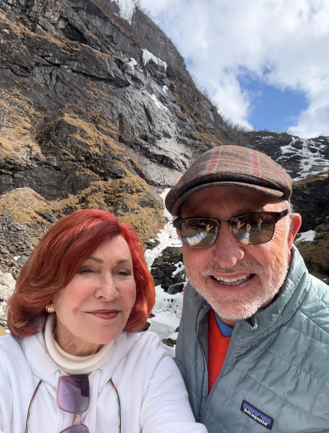 The author and Bob sailing on a catamaran through Sognefjord, Norway's largest and one of its most breathtaking fjords.