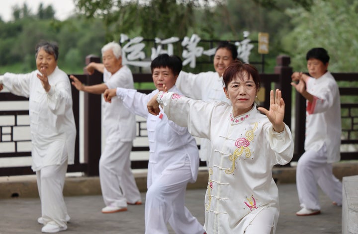 Residents practice tai chi along the Grand Canal in Gucheng County, Hengshui City, north China's Hebei Province, June 5, 2026.